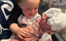 When a 1-year-old boy with Down syndrome meets his newborn sister for the first time, he cries whenever she is taken away.