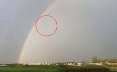 A mysterious black object descends from the sky during a thunderstorm, just like in The War of the Worlds