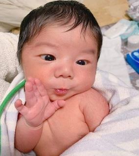 Pictures Of Newborn With Amusing Expressions Will Melt Your Heart