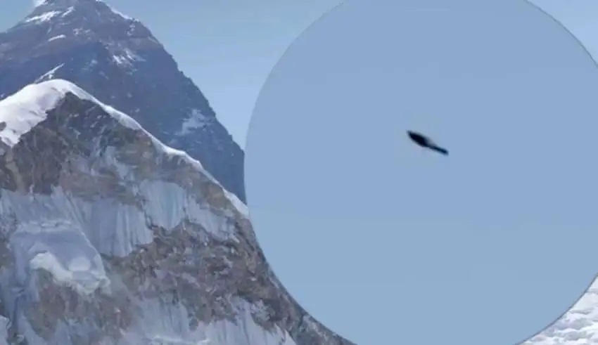 On Mount Everest, a UFO is shown in a mountaineer’s photo